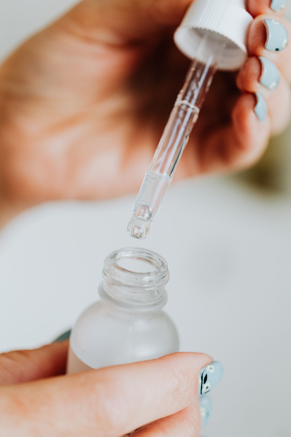 A serum dropper and skincare detail